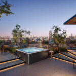 outdoor jacuzzi® hot tubs - the J-LXL hot tub with a cityscape in the background
